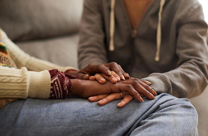 mother and daughter holding hands