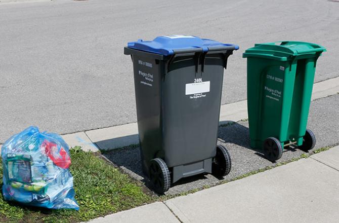 recycling and curbside carts at bottom of driveway