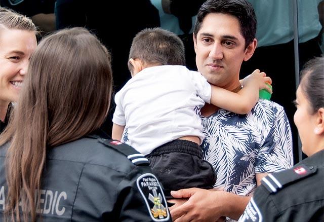 Paramedics with a family